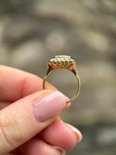 Opal and Diamond Halo Ring