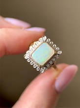 Opal and Diamond Halo Ring