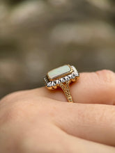 Opal and Diamond Halo Ring